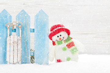 Christmas snowman toy, decor and fir tree branch