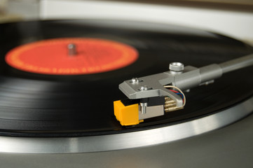 Close View of an Old Turntable with a Vinyl Record