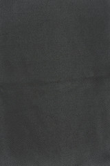 Highly detailed all over background texture of black and silver gray stripe textile in synthetic fabric.