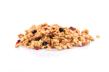 Muesli oat cereals close up background with dry fruits