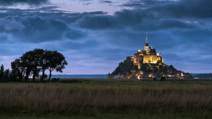 After sunset at Le Mont Saint Michelle in summer, blue hour