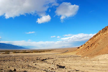 Road in Death Valley National Park on cloudy, California, USA.