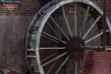 Fototapeta na wymiar Closeup of an overshot wheel from the Old Lindale Grist Mill in Georgia