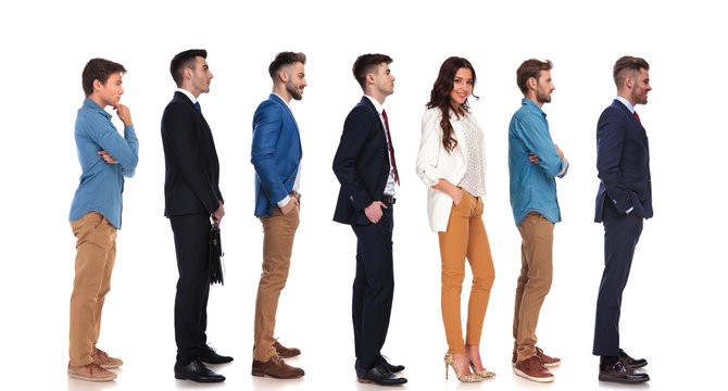 Relaxed Businesswoman And Group Of Men Waiting In Line