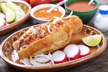 Drowned pork cake with sauce.