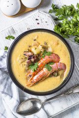 Chowder soup with seafood and prawn shrimps.