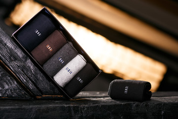 A set of classic winter socks in a black gift package