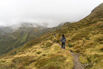 Fototapeta premium Hikers in Tyrol Alps at summer