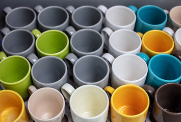 Group of colorful cups on table, closeup