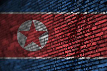 North Korea flag  is depicted on the screen with the program code. The concept of modern technology...