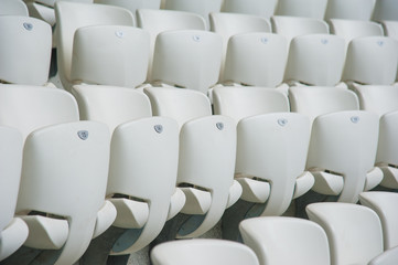 Naklejka premium Empty white seats in stadium