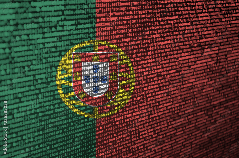 Poster portugal flag is depicted on the screen with the program code. the concept of modern technology and 