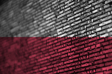 Poland flag  is depicted on the screen with the program code. The concept of modern technology and...