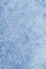 the texture of the fur is genuine faux blue background soft warm cozy