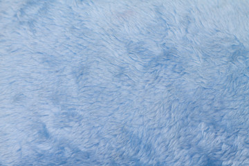 the texture of the fur is genuine faux blue background soft warm cozy
