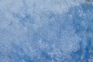 the texture of the fur is genuine faux blue background soft warm cozy