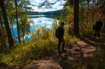 Tourist girl and beautiful autumn nature