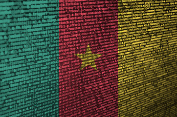 Cameroon flag  is depicted on the screen with the program code. The concept of modern technology...