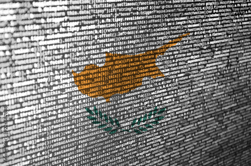 Poster cyprus flag is depicted on the screen with the program code. the concept of modern technology and si
