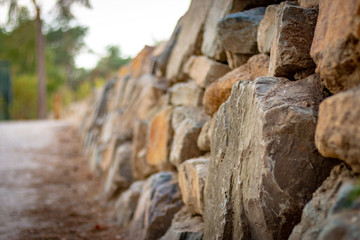 Background photo of a wall built with natural stone