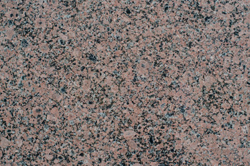 Pink granite slab close up texture