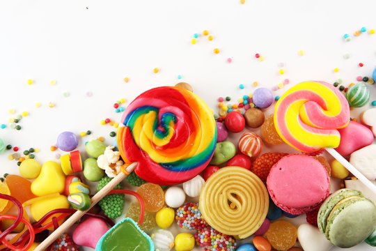 candies with jelly and sugar. colorful array of different childs sweets and treats.