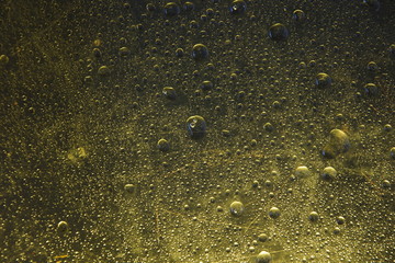 frozen water drops Golden background