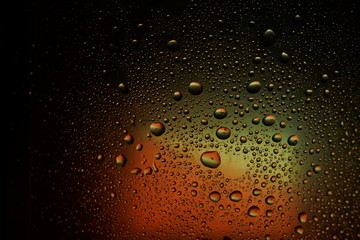 water drops autumn red orange pink background setting sun multicolor