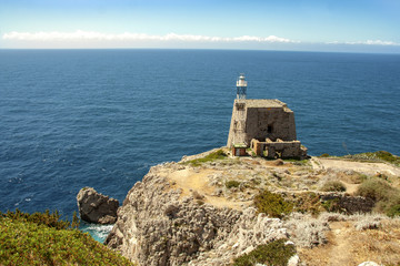 Fototapeta na wymiar The tower and lighthouse of Punta Campanella at Sorrento