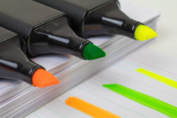3 orange, green and yellow text markers