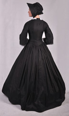 Fototapeta premium Victorian woman in black dress