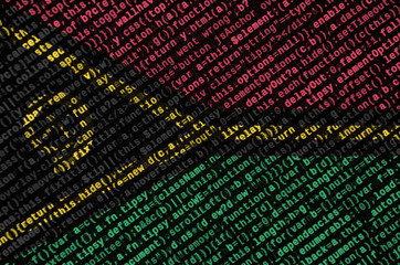 Vanuatu flag  is depicted on the screen with the program code. The concept of modern technology and...