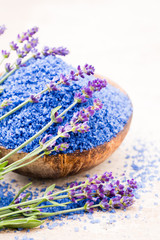 Essential lavender salt with flowers top view.