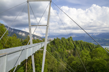 modern suspension bridge stretched between the mountains in Thun, Switzerland