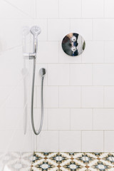 Chrome clean shower head in the bathroom