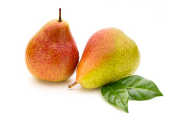 Fresh bio pear with leaves on isolated white background.