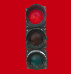 traffic light on red color isolated on red background