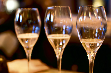 Champagne glasses in tow selective focus 