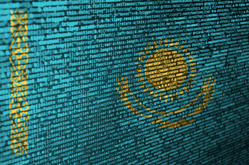 Kazakhstan flag  is depicted on the screen with the program code. The concept of modern technology...