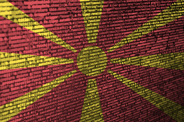 Macedonia flag  is depicted on the screen with the program code. The concept of modern technology...