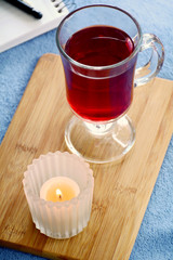 Red tea and candle