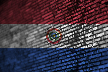 Paraguay flag  is depicted on the screen with the program code. The concept of modern technology and site development