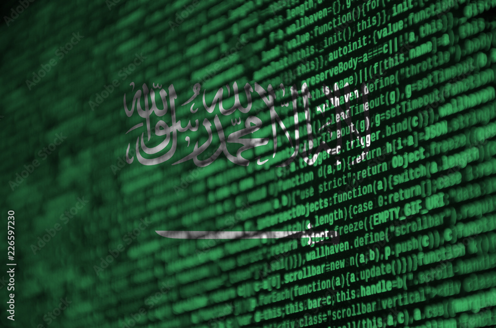 Poster saudi arabia flag is depicted on the screen with the program code. the concept of modern technology 