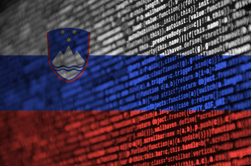 Slovenia flag  is depicted on the screen with the program code. The concept of modern technology...