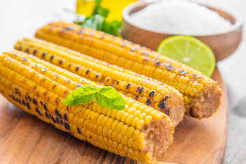 delicious grilled corn with salt and parsley © Lsantilli