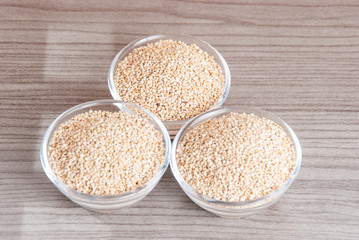 Grains of quinua on wood - Chenopodium quinoa