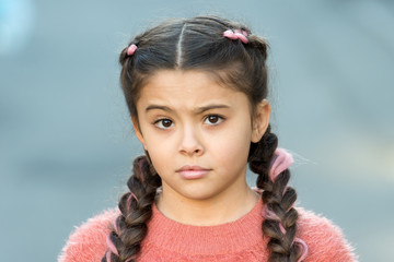 Autumn fashion for pretty girl. surprised little girl in autumn sweater. Happy childhood. Autumn snuggles. Autumnal sadness. Small child with long hair. Casually beautiful. Depressive season