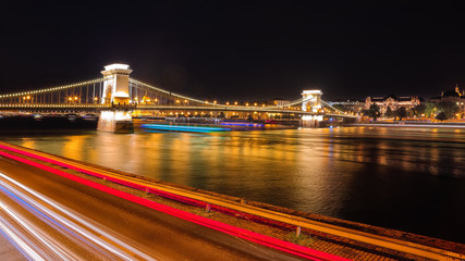 Fototapeta na wymiar Budapest city night scene. View at Chain bridge, river Danube and famous building of Parliament