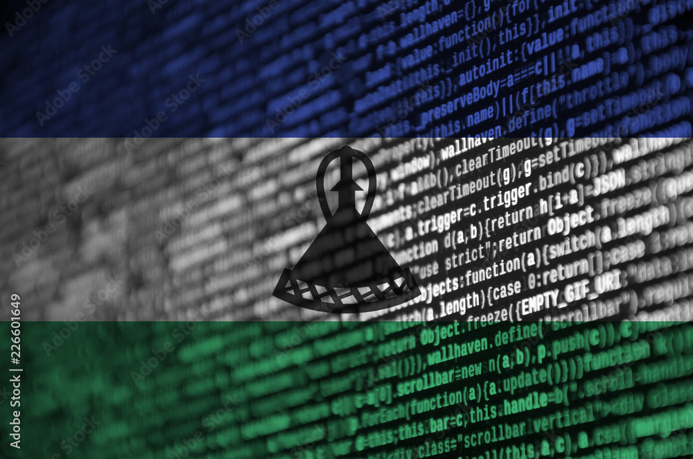 Poster lesotho flag is depicted on the screen with the program code. the concept of modern technology and s