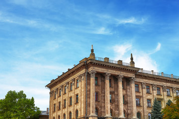 Part of an old building against the blue sky